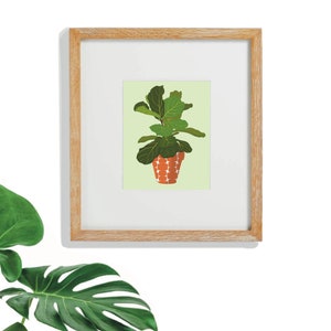 Może przedstawiać: Ilustracja w ramie przedstawiająca doniczkową roślinę figowca liściowego z zielonymi liśćmi i wzorzystym pomarańczowym doniczką na jasnozielonym tle.