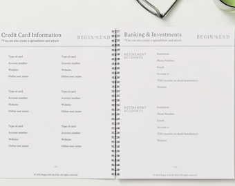 May include: Open notebook with spiral binding, featuring pages for credit card information and banking details. Text includes "Credit Card Information" and "Banking & Investments." The notebook is designed for financial organization.