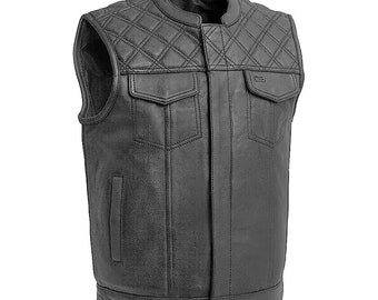 May include: Black leather vest with a quilted shoulder design and two front pockets. The vest has a mandarin collar and a vertical pocket on the left side. The vest is sleeveless and has a classic biker style.