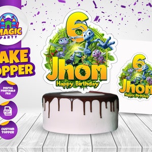 May include: A printable cake topper featuring a cartoon ant character with a green background and the text "Jhon Happy Birthday".