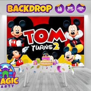 May include: A rectangular party backdrop featuring Mickey Mouse in various poses against a red and black background. The text reads "TOM TURNS 2" in large red letters. The design includes a table with a birthday cake and gifts, with a size of 72" x 48".