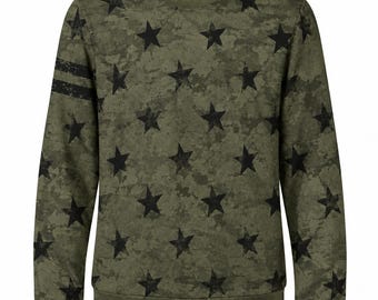 May include: A long-sleeve crewneck sweatshirt in an olive green camouflage pattern featuring a repeating print of black stars. The right sleeve displays two horizontal black stripes near the shoulder, and the garment has a ribbed collar, cuffs, and hem.