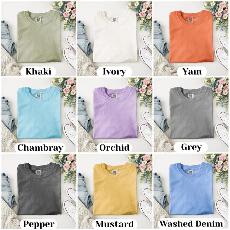 May include: Nine different colored t-shirts are displayed, each folded neatly. Colors include khaki, ivory, yam, chambray, orchid, grey, pepper, mustard, and washed denim. Each shirt is paired with jeans, a sweater, and white sneakers. The names of the colors are printed below each shirt.