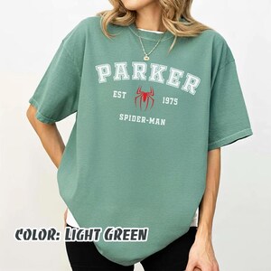 May include: A handmade, wooden cutting board with a natural finish. The board features a live edge on one side and a rectangular shape. It is approximately 18 inches long, 12 inches wide, and 1 inch thick.