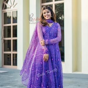 bandhani long dress Green Bandhani Anarkali Dress with Scallop Neckline #attireofyourwish  Checkout our site to get prettier outfit #ethnicwear #anarkalidress # bandhani #greendress #scallopneckline #festivalwear #EmbellishedDupatta  #occasionwear #westernwear #onepiece