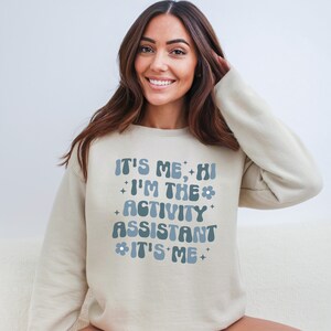 Trendy Shirts for Activity Assistant, It's Me Hi, I'm the Activity Assistant Sweatshirt, Activity Director Gift for Assistant Professional image 2