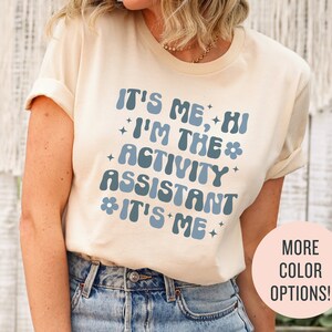 Trendy Shirts for Activity Assistant, It's Me Hi, I'm the Activity Assistant Sweatshirt, Activity Director Gift for Assistant Professional image 1