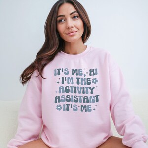 Trendy Shirts for Activity Assistant, It's Me Hi, I'm the Activity Assistant Sweatshirt, Activity Director Gift for Assistant Professional image 7