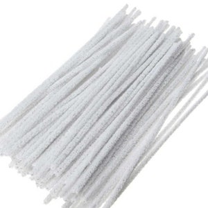 May include: A bundle of white pipe cleaners, ideal for craft projects. The pipe cleaners are soft, fuzzy, and flexible, perfect for creating various shapes and designs. They are a versatile crafting supply for both children and adults.