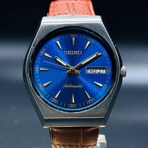 Rare vintage Seiko 5 fusée automatique cadran bleu boîtier en argent jour/date calibre n° 6309A montre-bracelet pour homme fabriquée au japon