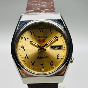 A Vintage Seiko 5 Automatic Gold Urdu Dial,  Silver Case Day/Date Caliber No.7009, Men&#39;s Wrist Watch  ,Japan Made