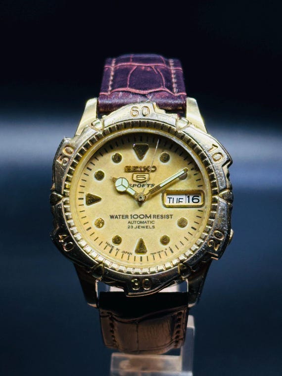 Vintage Seiko Sports Automatic Watch: Gold Dial, Day/date, 23