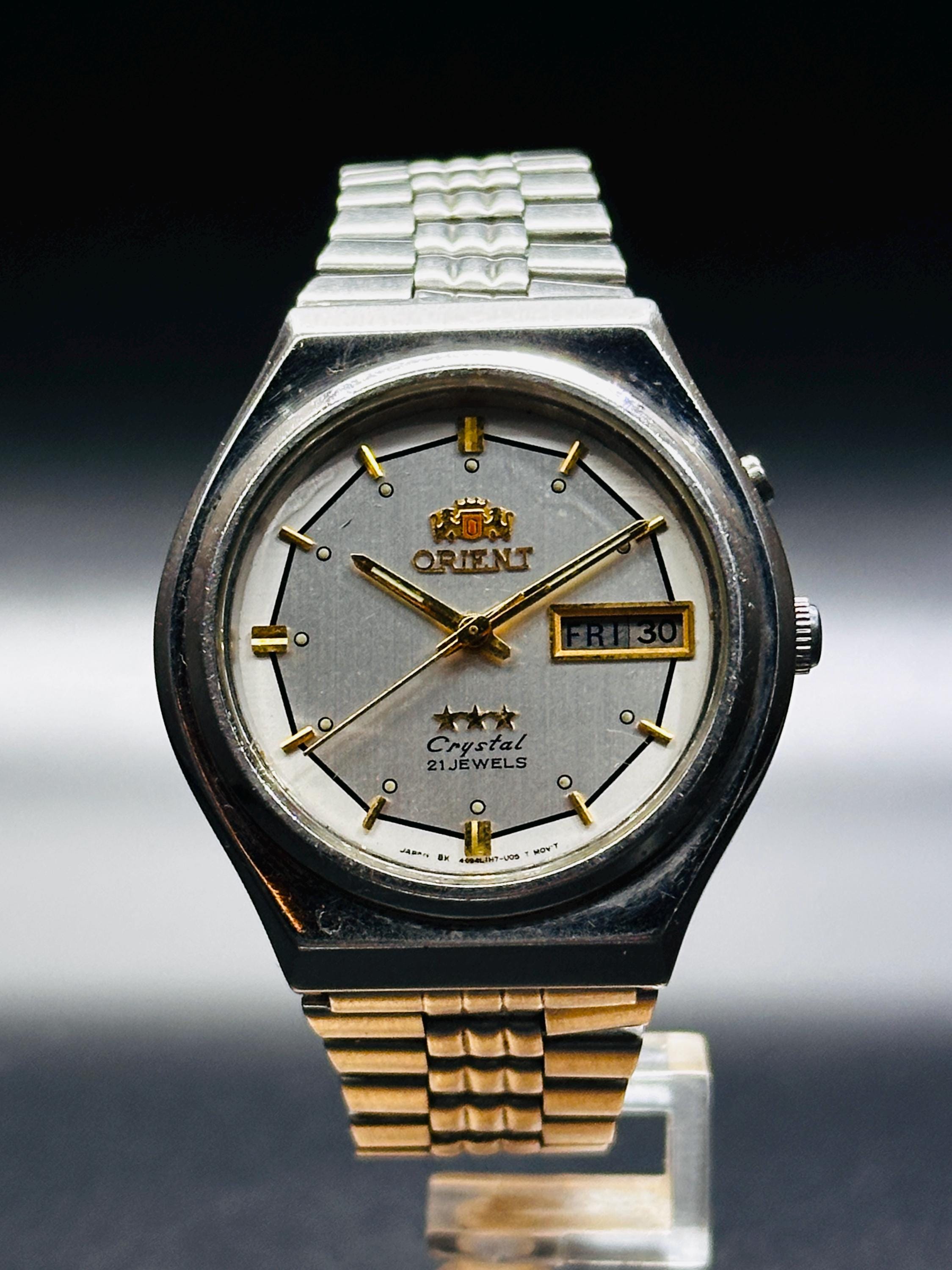 Vintage Orient Crystal Automatic Watch: Silver Dial, Day/date