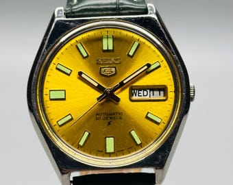 Vintage Seiko 5 Automatic: Gold Dial, Stainless Steel Case, Day/Date
