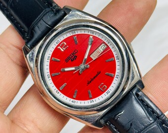 Vintage Seiko 5 Automatic Watch: Red Dial, Stainless Steel Case 