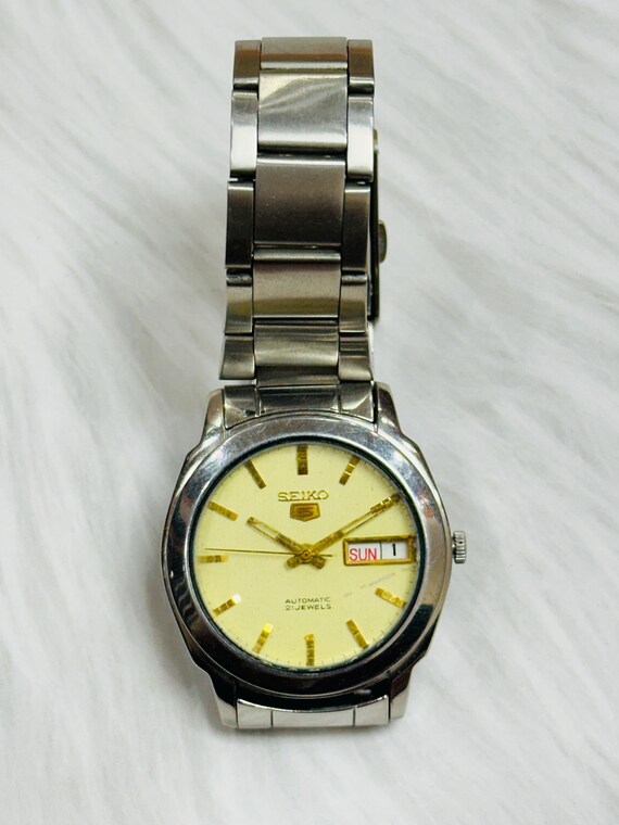 ヴィンテージ セイコー5 自動巻き腕時計：ゴールド文字盤、シルバー