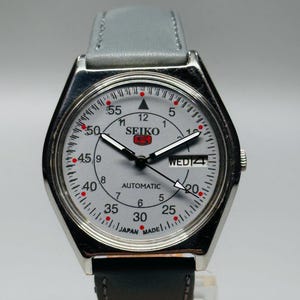 Vintage Seiko 5 Automatic Racer: Silver Stainless Steel Case, Day/Date