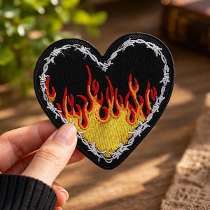 May include: A set of three ceramic mugs with a speckled, matte finish. The mugs are in shades of cream, light gray, and dark gray. Each mug has a simple, minimalist design and a rounded handle.