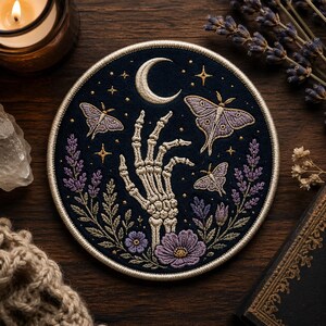 Custom embroidered skeleton hand patch with moon moth and lavender flowers gothic celestial iron on patch witch aesthetic