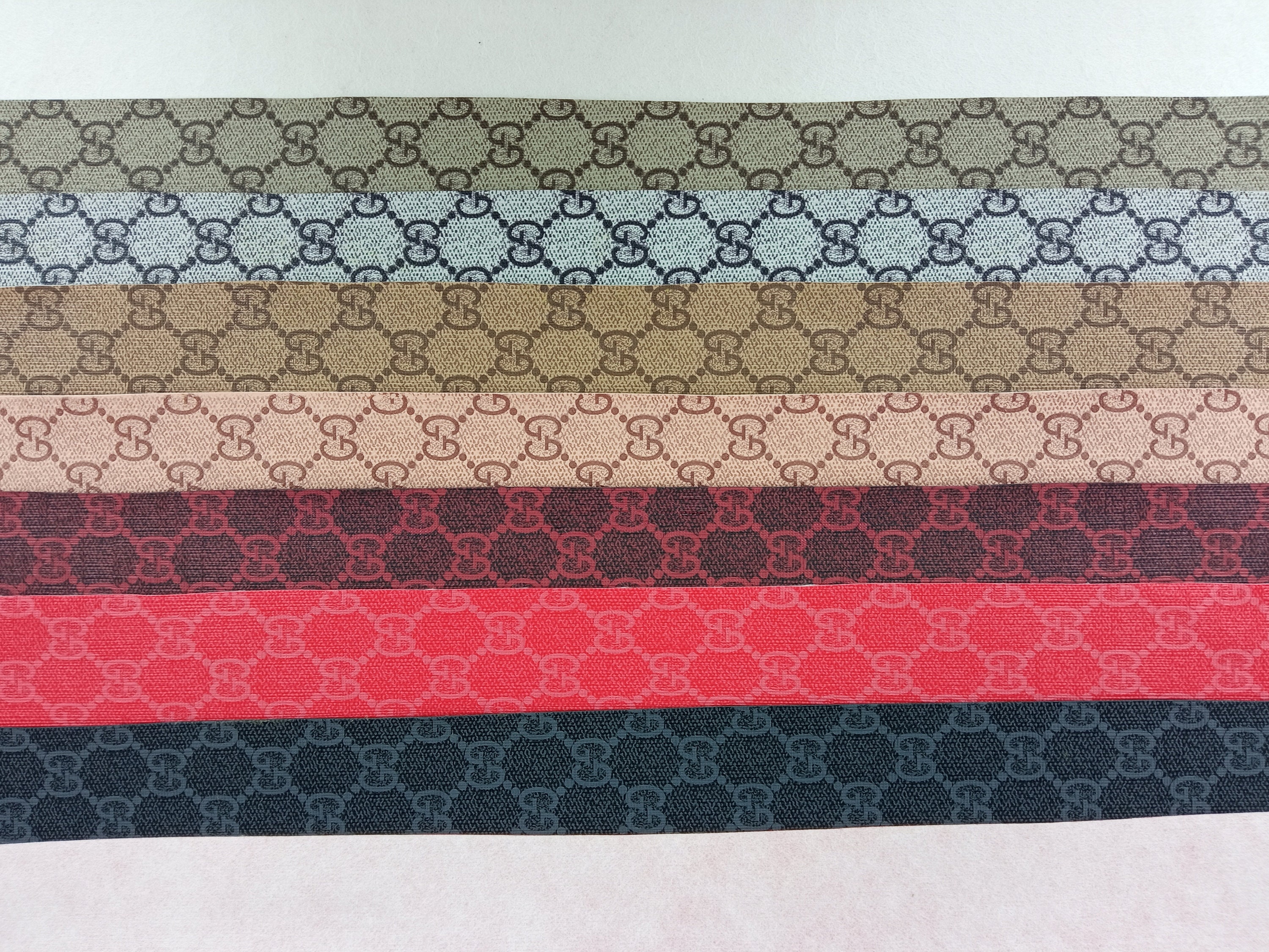Black LV leather fabric with mini gold shiny patterns