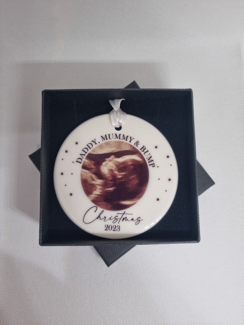 Ceramic bauble personalised with baby scan photo