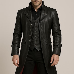 May include: A black leather coat with a matching vest. The coat has a high collar, multiple buttons, and a long, flowing design. The coat's interior lining is red. The model is wearing a black shirt and black pants.