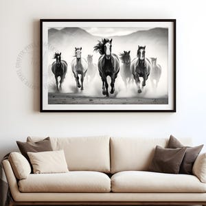 Black and white digital poster of wild horses running through the desert, showcasing motion, freedom, and natural beauty. Printable wall art available as an instant digital download.