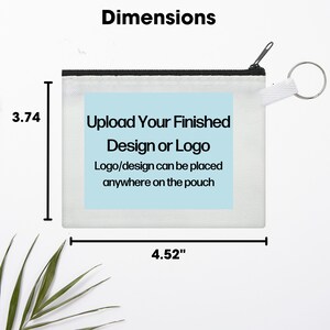 May include: A white zippered pouch with a light blue rectangle that says "Upload Your Finished Design or Logo" and "Logo/design can be placed anywhere on the pouch". The pouch measures 4.52 inches wide and 3.74 inches tall.