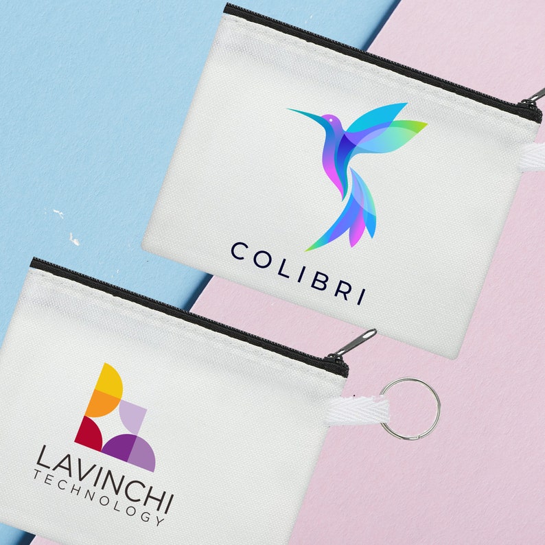 May include: Two white zippered pouches with different logos. The first pouch features a colourful hummingbird logo with the text "COLIBRI" below it. The second pouch has a colourful geometric logo with the text "LAVINCHI TECHNOLOGY" below it.