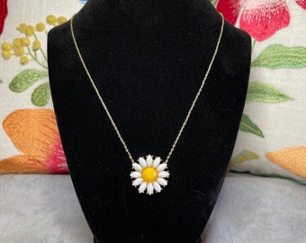 Pretty little sunflower pendant necklace. Nickel free 18.5 inch golden chain