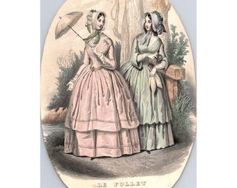Grabado antiguo de moda francesa de la década de 1850: "Le Follet", lámina de moda parisina femenina, coloreado a mano