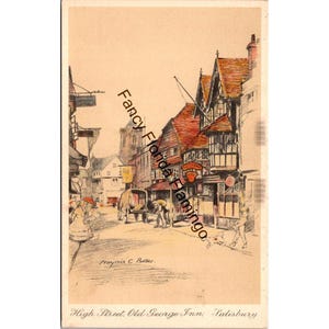 Peut inclure: Carte postale ancienne représentant une rue avec des bâtiments à colombages, une calèche et des personnages. Le titre est "High Street, Old George Inn, Salisbury". Signature de l'artiste incluse.