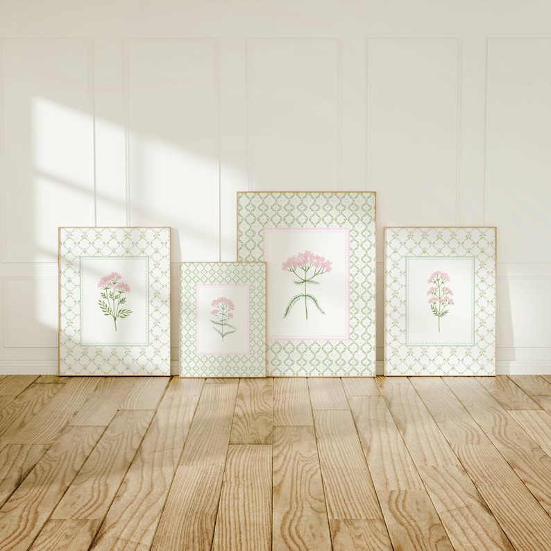 May include: Four framed botanical prints with a green and white geometric pattern border. Each print features a pink flower with green leaves on a white background.