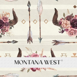 May include: A seamless pattern featuring watercolor illustrations of arrows, buffalo horns, and floral bouquets in shades of pink, purple, and brown. The pattern is set against a light beige background with thin horizontal stripes.