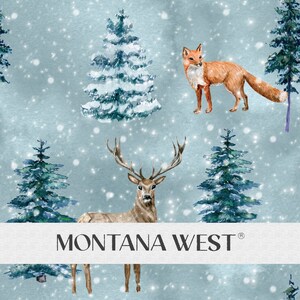 May include: A wintery scene featuring a red fox, a deer with antlers, and pine trees covered in snow. The text "MONTANA WEST" is displayed on a white banner.
