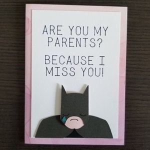 Tarjeta de felicitación en capas de Batman con línea para recoger