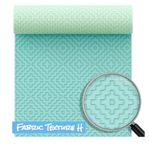 May include: A close-up of a light blue fabric with a repeating geometric pattern. The fabric has a textured surface and is rolled up at the top. A magnifying glass is positioned over the fabric, showing the detail of the pattern.