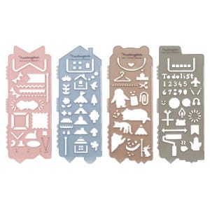 May include: Set of four plastic stencils with different designs. The stencils are in pink, blue, brown, and grey. The designs include houses, animals, flags, numbers, and other symbols. The stencils are labelled "To do list" and "Maskingplate".