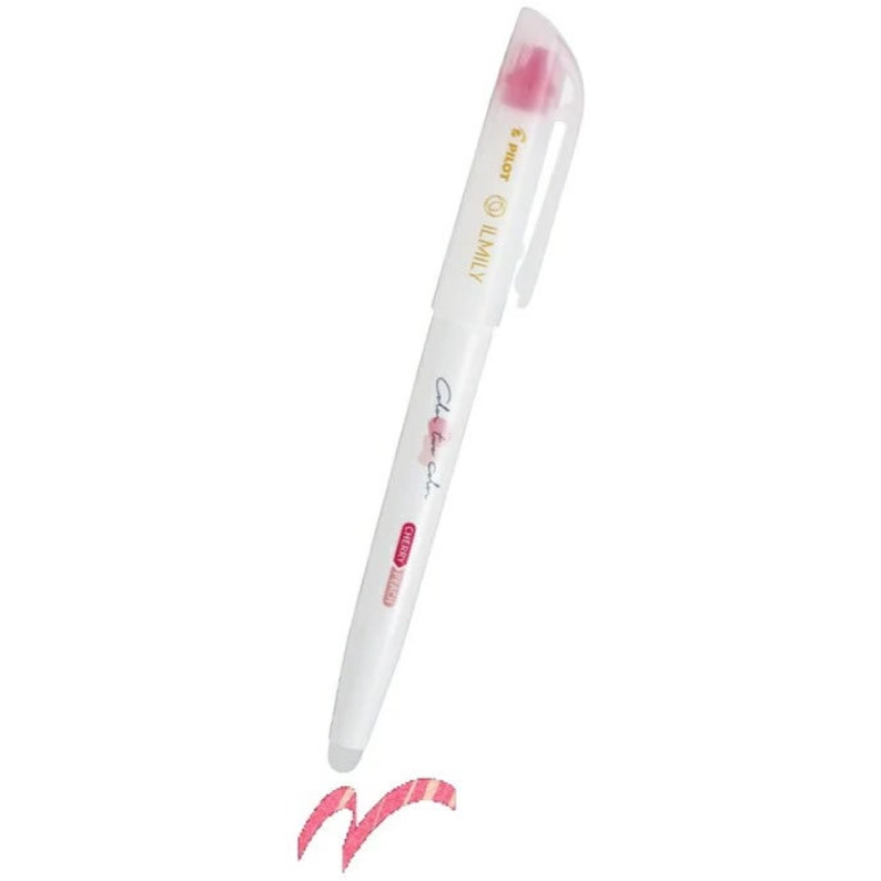 Peut inclure: Stylo encre gel Pilot ILimily blanc avec un capuchon rose et un &eacute;chantillon d'encre rose. Le stylo porte l'inscription "Texture cr&eacute;meuse".