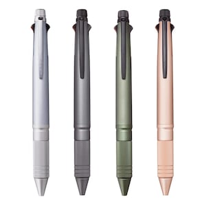 May include: Four multi-color pens arranged vertically. Each pen features a textured grip section, a pocket clip, and a top-mounted selector mechanism. The pens are finished in metallic silver, dark charcoal gray, olive green, and rose gold colors.