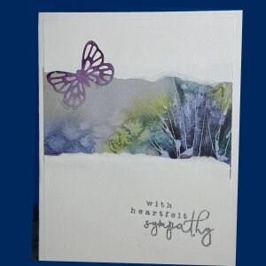 Carte de sympathie fabriquée à la main avec un feuillage délicat et un papillon découpé - salutation sympathique