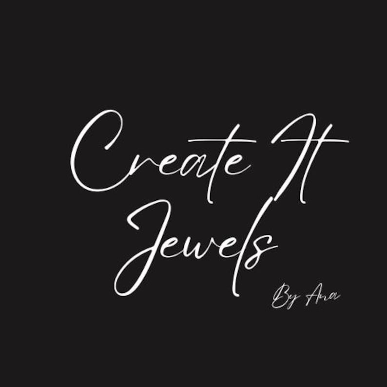 May include: Black background with the white cursive text "Create It Jewels" and "By Ana" in a smaller font. The text is centered and the overall design is simple and elegant.