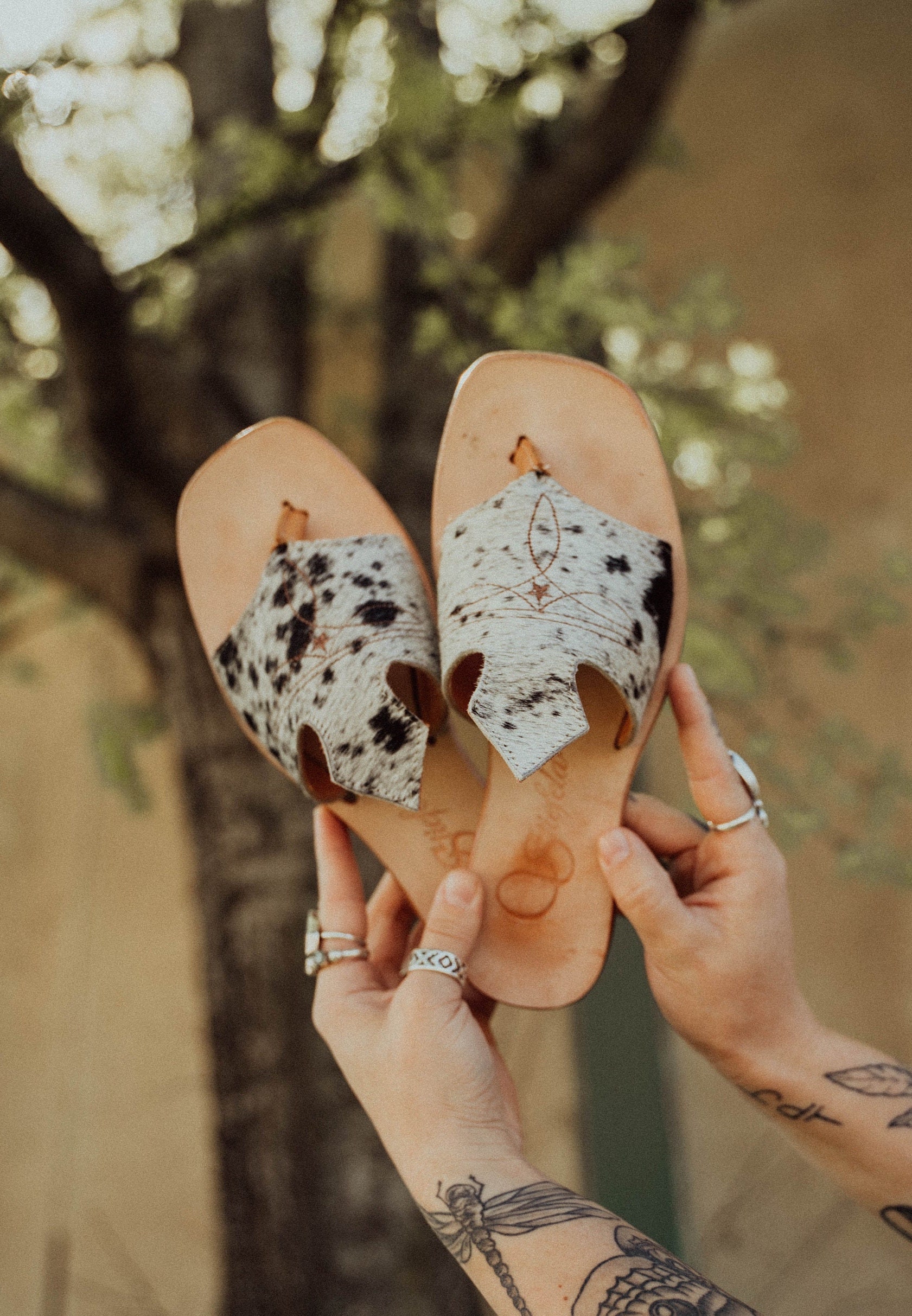 Cow print top flip flops