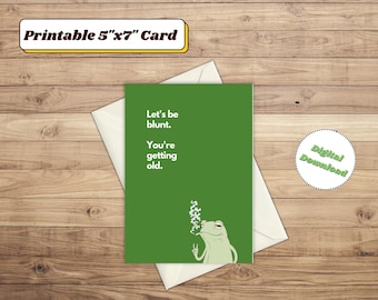 May include: A printable 5x7 inch card with a green background and a cartoon frog smoking a joint. The text on the card reads "Let's be blunt. You're getting old."