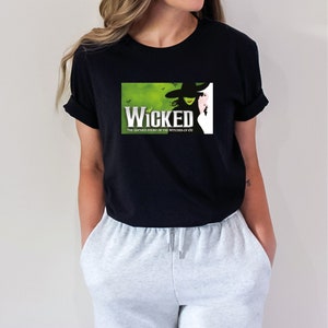 Purple WICKED THE MUSICAL Broadway I Love OZ Logo T-shirt Ladies small –  Full On Cinema