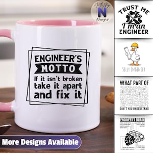 May include: White ceramic mug with a pink interior and handle. The mug features the text "ENGINEER'S MOTTO: If it isn't broken take it apart and fix it" in a black rectangular design. Additional designs are shown.