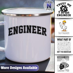 May include: White enamel mug with a silver rim and a black "ENGINEER" text. Additional designs include "Trust Me I'm an Engineer", a cartoon duck, and mathematical equations. The mug has a handle and the text "More Designs Available".