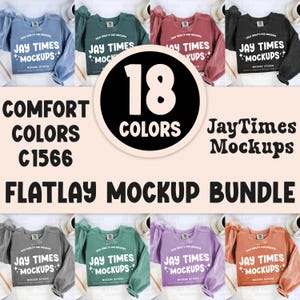 Op de afbeelding: Een flatlay mockup bundel met 18 comfort kleuren sweatshirts in diverse tinten, waaronder blauw, groen, rood en zwart. De sweatshirts tonen de tekst "Jay Times Mockups". De afbeelding bevat ook de tekst "Comfort Colors C1566" en "Flatlay Mockup Bundle".