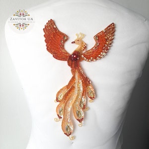 Embroidered applique phoenix patch bird beaded applique on an evening dress, denim jacket, handbag, coat or other clothes.