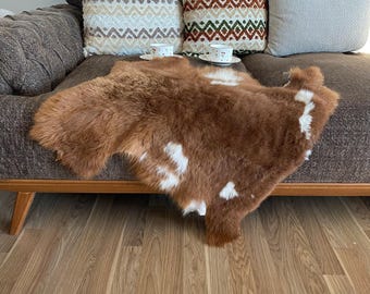 Handcrafted Brown Goat Hide Rug: Soft Genuine Leather, Rustic Decor